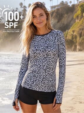 NWOT SOLUMBRA White Black Leopard Print WaterShade Rash Guard Top 100+ SPF
